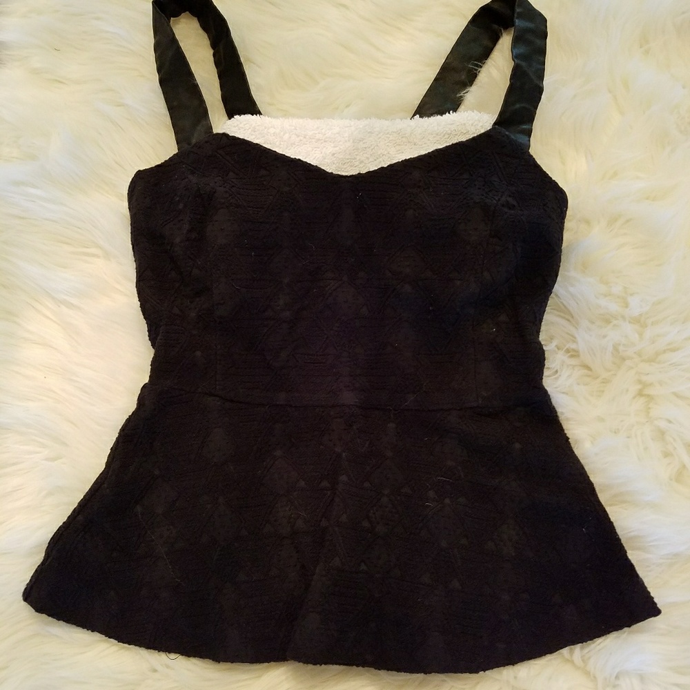 Black peplum embroidered top with faux leather str